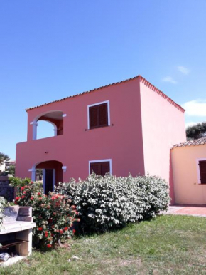 casa rosa in residence con piscina -la spiaggia è raggiungibile a piedi